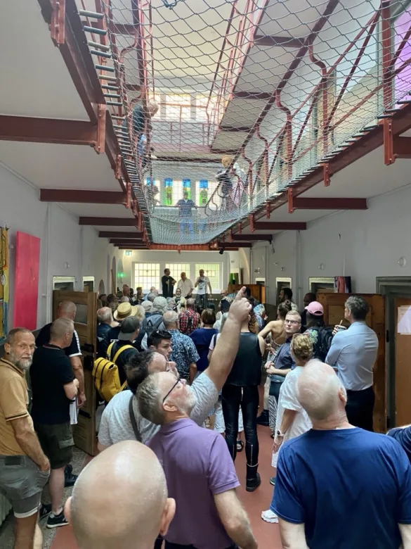 people at an art show in berlin at pride art berlin